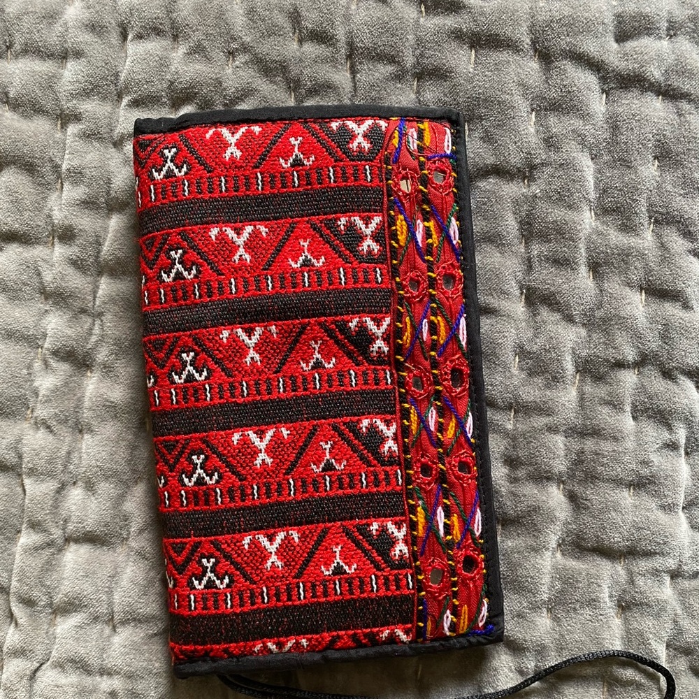 Hand made with embroidery.